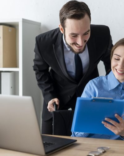 adult-man-woman-working-together-office